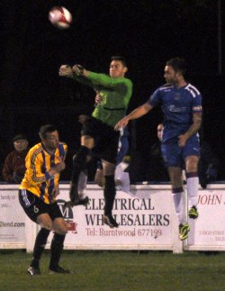 Nick Wellecomme puts the Sporting Khalsa keeper under pressure. Pic: Pamela Mullins