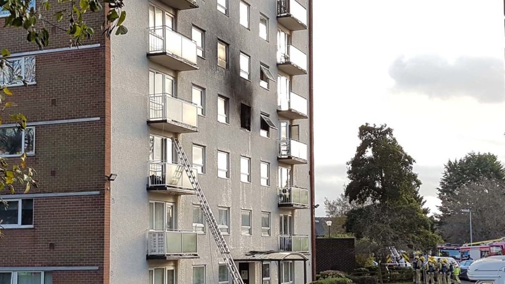 Smoke damage visible on the outside of the block of flats