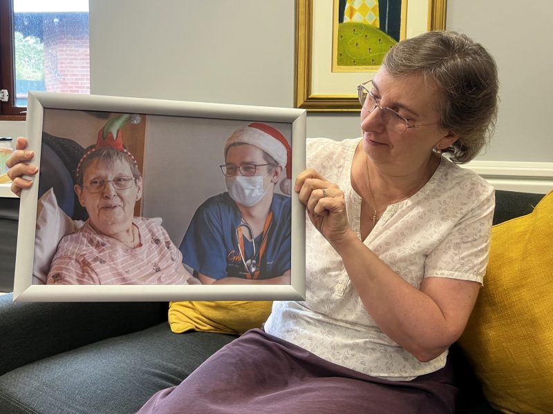 Hazel Plant with a picture of her mother, Beryl, during her stay at St Giles Hospice last Christmas